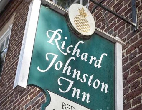 The Richard Johnston Inn hanging sign for our inns in Fredericksburg VA