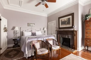 Luke Henry Bedroom - lavender room with fireplace
