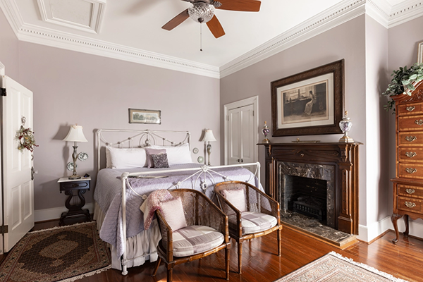 The Luke Henry - lavender luxury suite with fireplace at 1890 Caroline House bed and breakfast in Fredericksburg VA