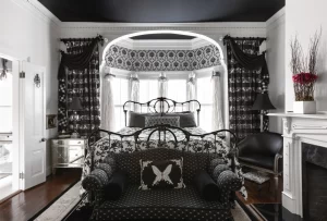 Luxurious black and white bedroom in The Sawyer Scott suite.