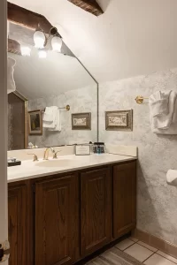 The Frejus private bathroom with angled ceiling