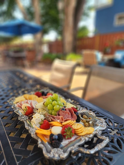 Fresh, hand-crafted charcuterie trays are among the indulgent add-ons available