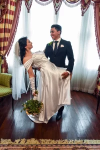 Newlyweds posing at 1890 Caroline House - small wedding venue in Fredericksburg VA