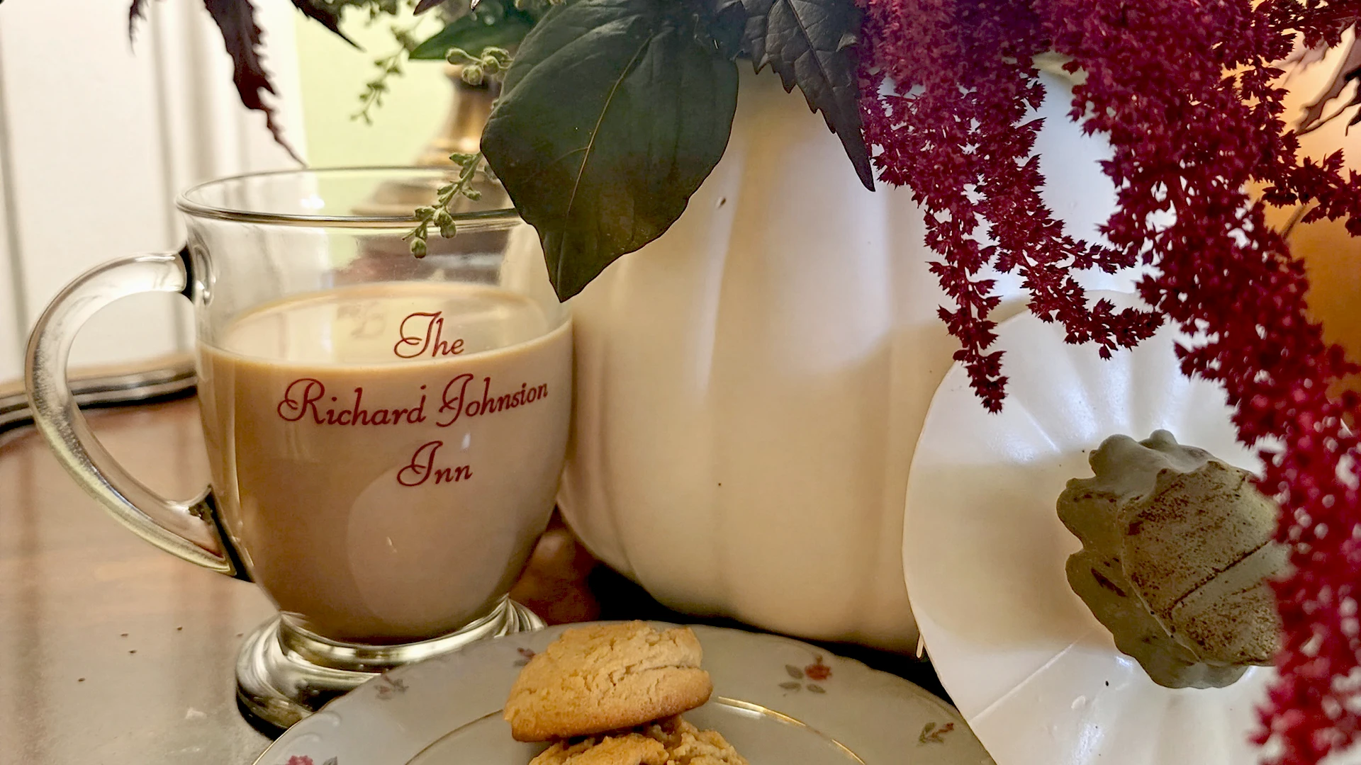 Image of coffee, cookies, and bouquet at The Richard Johnston Inn and 1890 Caroline House
