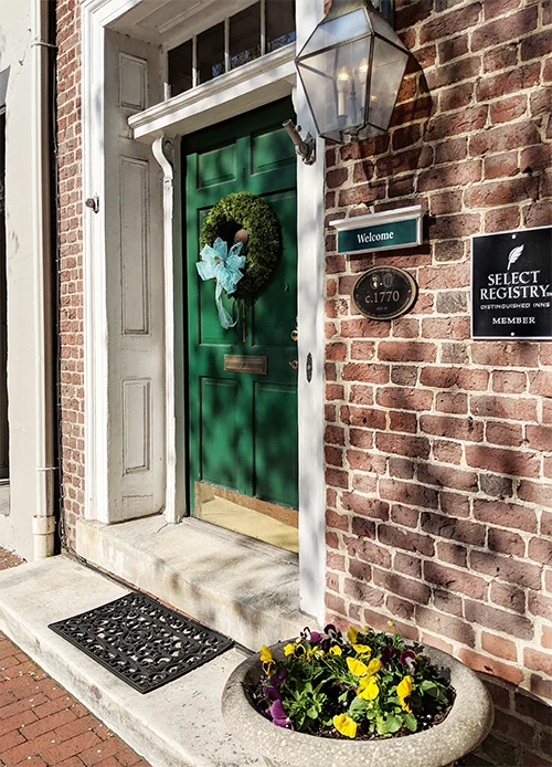 Front Entrance to The Richard Johnston Inn, with Select Registry sign and cute Welcome sign